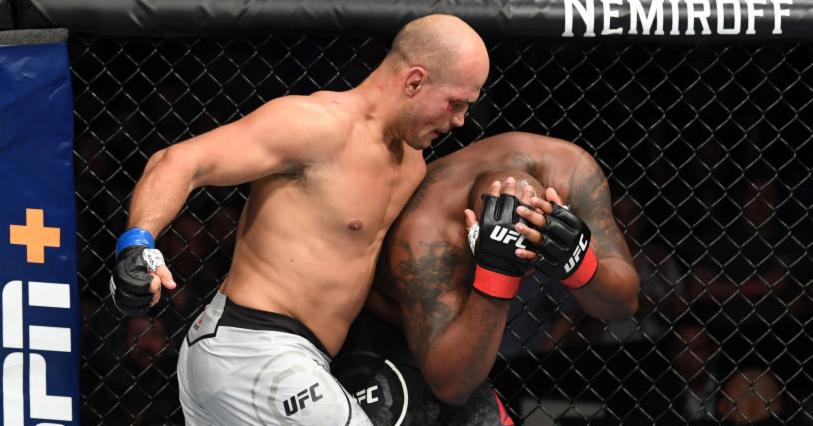 facebook-Linked_Image___junior-dos-santos-derrick-lewis-ufc-GettyImages-1129507484