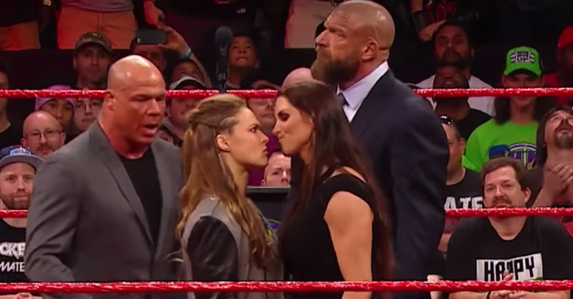 Watch Stephanie Mcmahon Body Slam Ronda Rousey Through A Table Days 