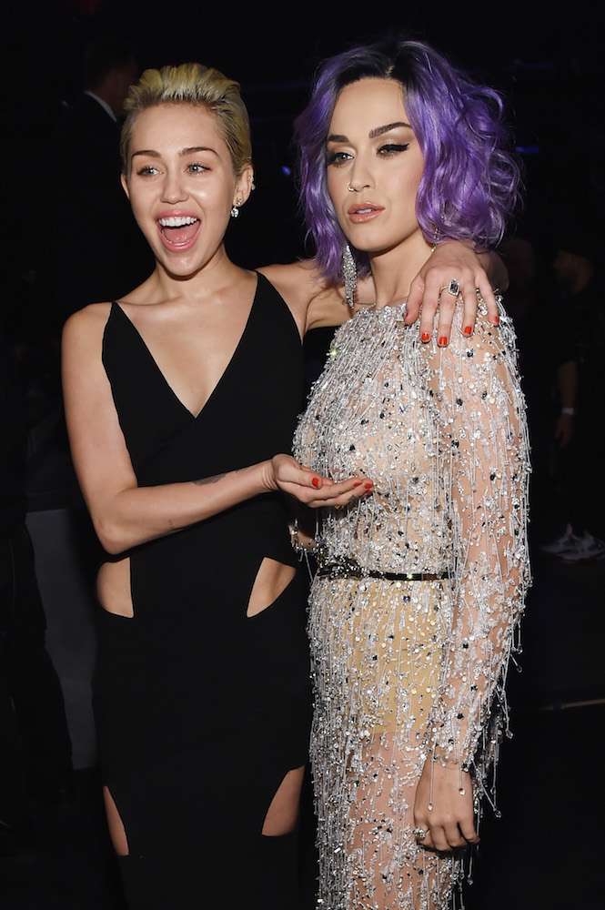 Miley Cyrus Nude Lesbian - Miley Cyrus Claims Katy Perry Wrote Her Breakout Hit 'I Kissed a Girl'  About Her - Maxim