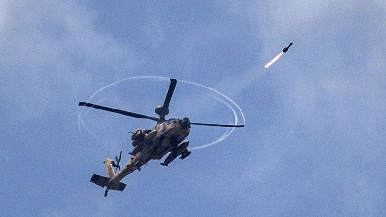 Apache helicopter in action. (Photo: Jack Guez/Getty Images)