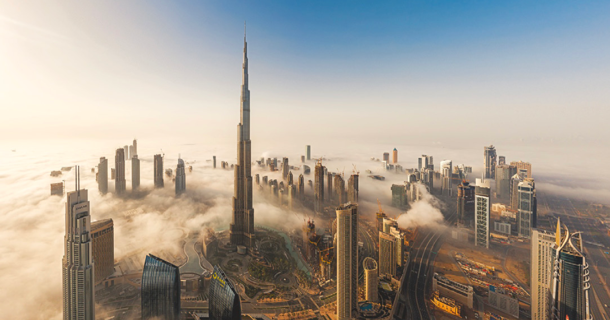 Aerial view of Dubai prominently featuring Burj Khalifa.