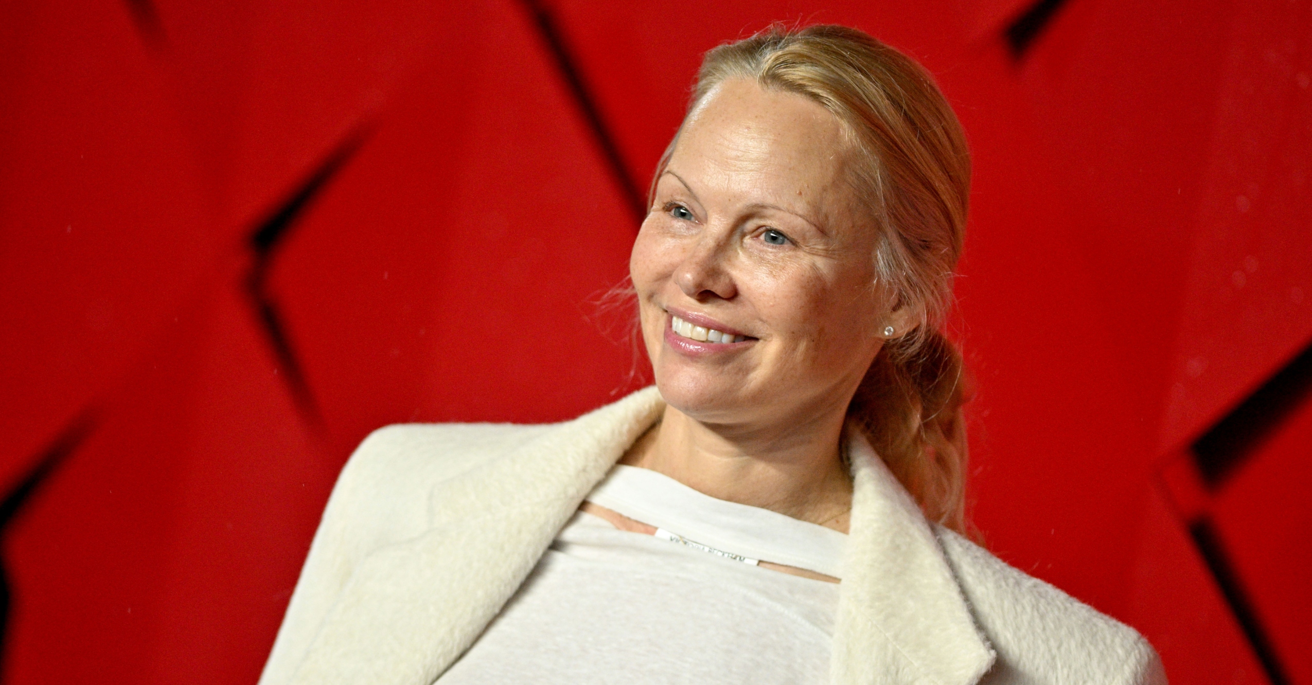 Pamela Anderson Goes Makeup Free For Spring 2024 Proenza Schouler